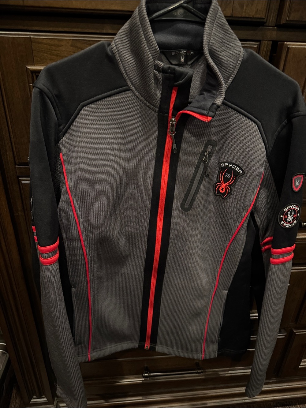 Spyder Men’s Gray Jacket with Red Accents
